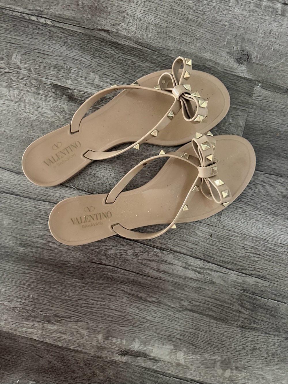 Valentino Garavani Beige Bow Thong Sandals with Gold Studs